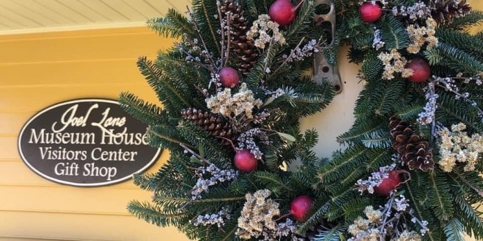 A Christmas Wreath in front of the JLMH Visitor's Center